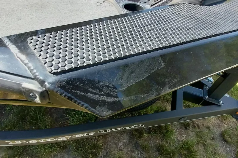 Slide: The Image of 2023 Ranger RT198P boat trailer with textured step detail. - 15