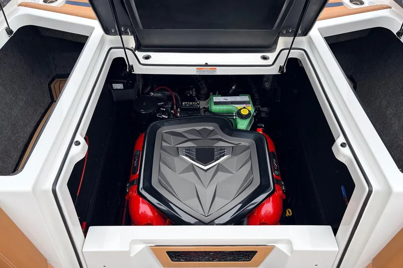 Slide: The Image of Engine compartment of 2026 Nautique Super Air Nautique G25 boat, showcasing modern design. - 63