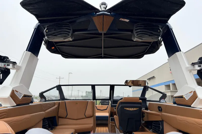 Slide: The Image of 2026 Nautique Super Air Nautique G25 interior with luxurious seating and advanced features. - 65