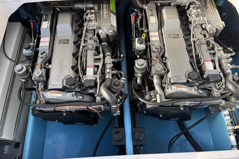 Slide: The Image of Twin engines in a 2018 Catamaran Coaches Lightning Powerboats, showcasing detailed mechanical components. - 16