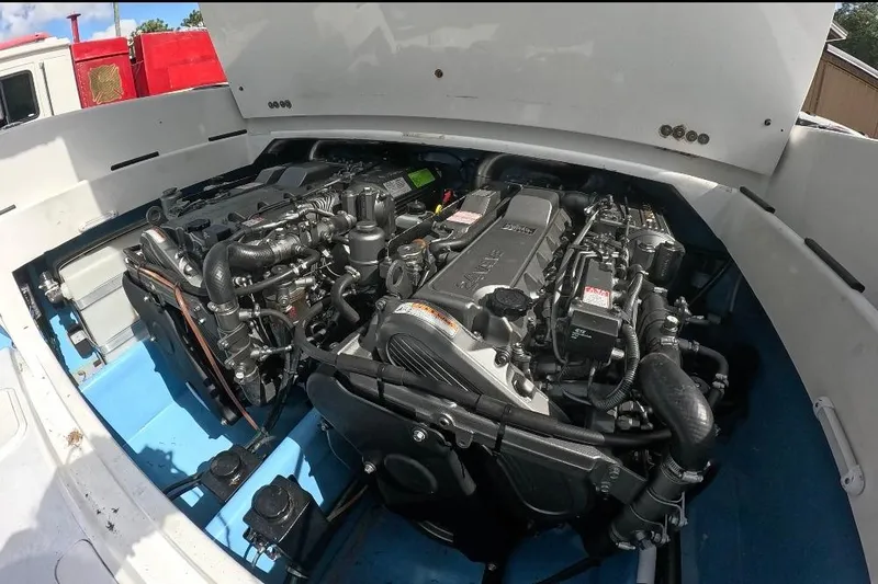Slide: The Image of Engine compartment of a 2018 Catamaran Coaches 38 Lightning boat, showcasing dual engines. - 17