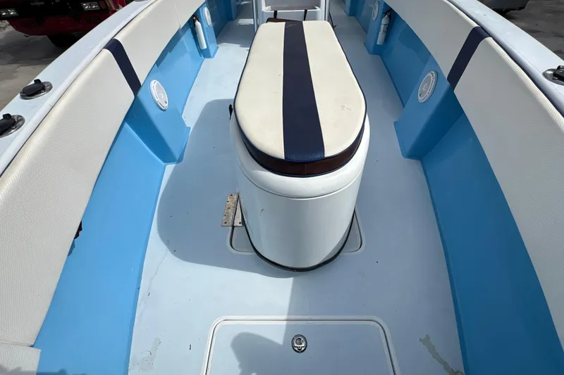 Slide: The Image of Interior of 2018 Catamaran Coaches 38 Lightning boat with blue and white seating. - 22