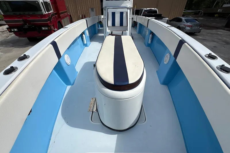 Slide: The Image of 2018 Catamaran Coaches 38 Lightning boat interior with blue and white seating. - 23