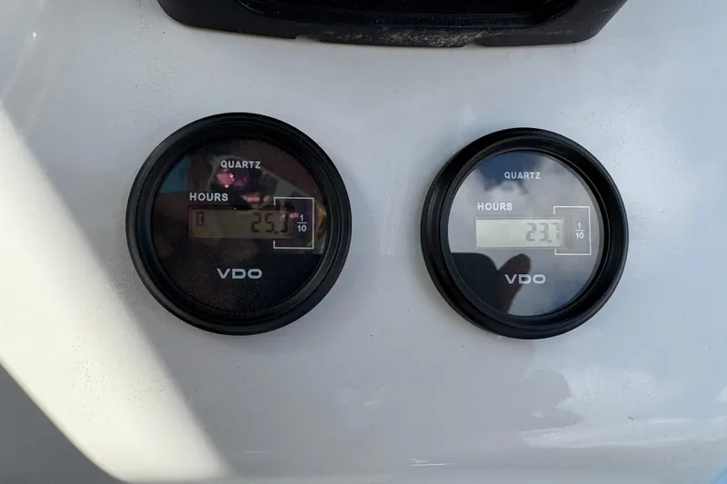 Slide: The Image of VDO hour meters on 2018 Catamaran Coaches 38 Lightning, displaying 25.1 and 23.7 hours. - 45