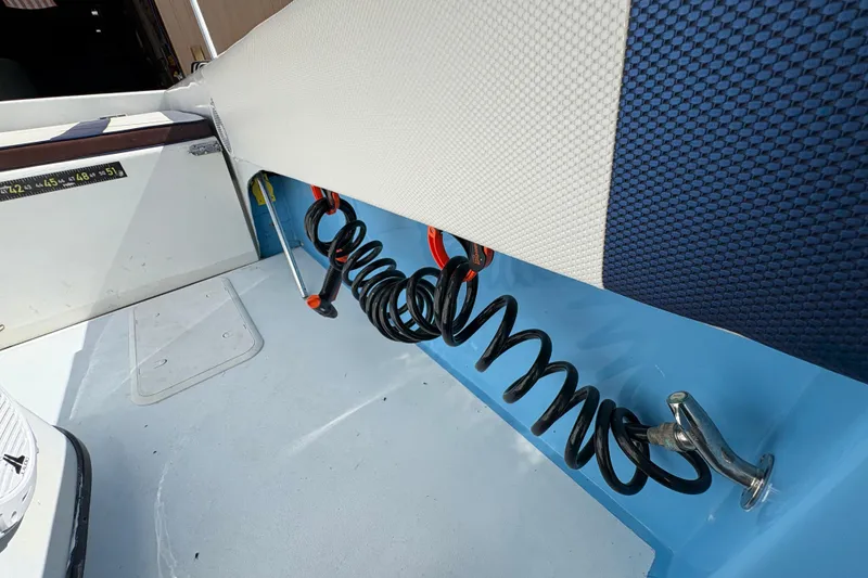 Slide: The Image of Interior view of a 2018 Catamaran Coaches 38 Lightning boat with coiled cables. - 48