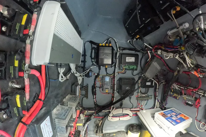 Slide: The Image of Electrical system inside a 2018 Catamaran Coaches 38 Lightning, showcasing wiring and components. - 56