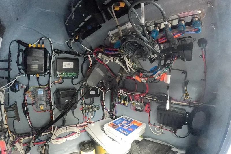 Slide: The Image of Electrical system inside a 2018 Catamaran Coaches 38 Lightning boat, showcasing wiring and components. - 57