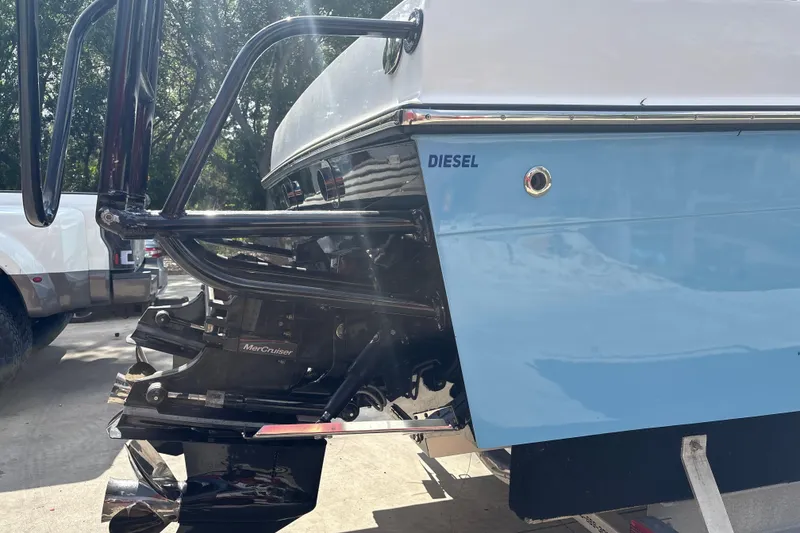 Slide: The Image of 2018 Catamaran Coaches 38 Lightning boat with diesel engine, featuring MerCruiser components. - 8