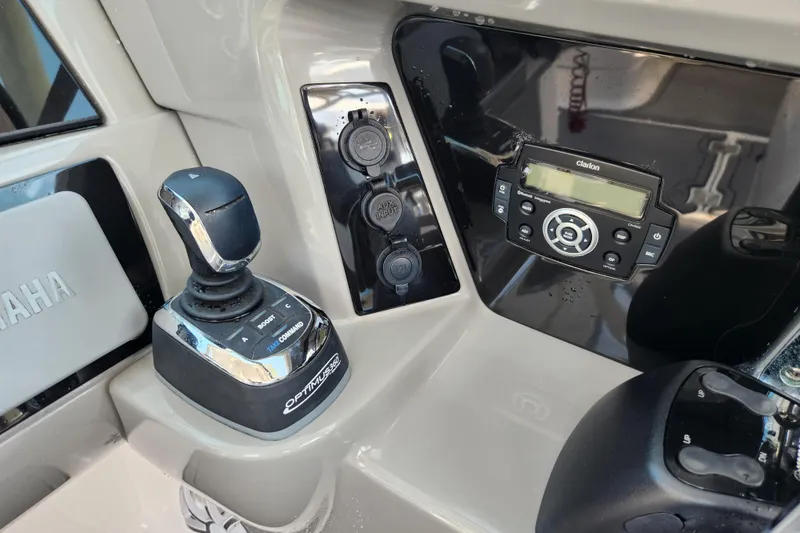 Slide: The Image of Control panel of 2019 Robalo R317 Dual Console with joystick and audio system. - 15