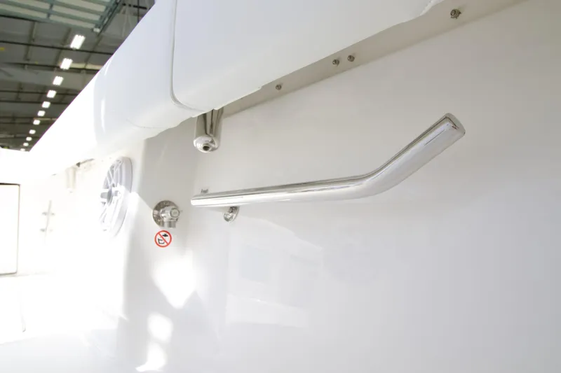 Slide: The Image of 2026 Regulator 35 boat interior detail with stainless steel handle and speaker. - 16