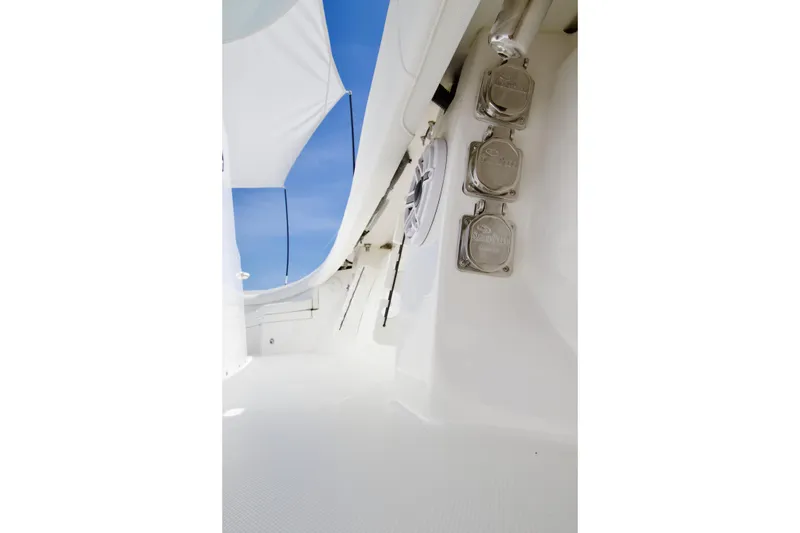 Slide: The Image of Interior view of 2026 Regulator 35 boat, showcasing sleek design and stainless steel fixtures. - 22