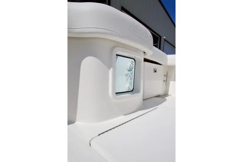 Slide: The Image of 2026 Regulator 35 boat detail, featuring sleek white exterior and window design. - 24