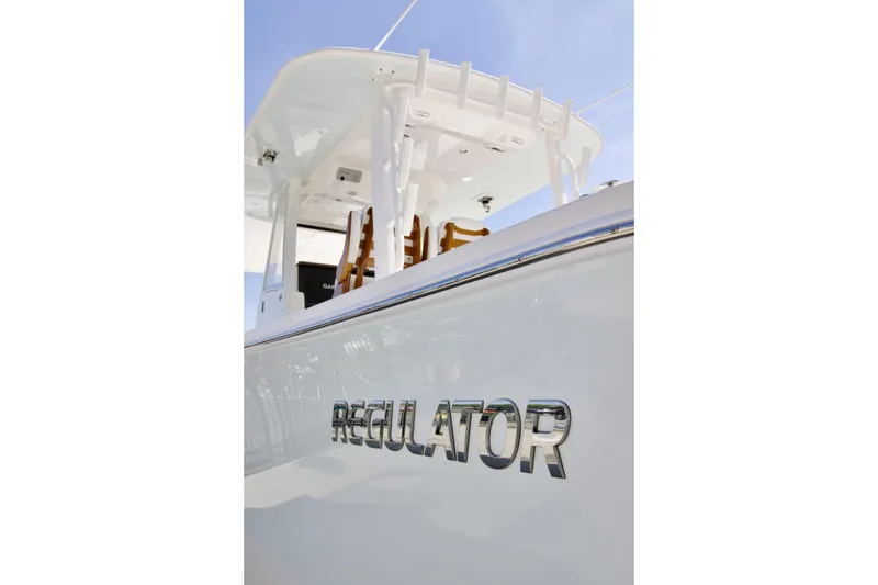Slide: The Image of 2026 Regulator 35 boat, sleek design, close-up view of branding and structure. - 27