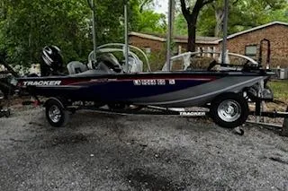 The Image of 2017 Tracker Pro Team 175 TF boat on trailer, parked outdoors. - 0