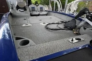 Slide: The Image of 2017 Tracker Pro Team 175 TF boat interior with seating and fishing deck. - 4