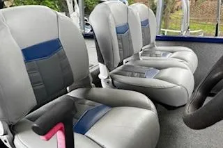 Slide: The Image of 2017 Tracker Pro Team 175 TF boat seats, featuring gray and blue upholstery. - 6