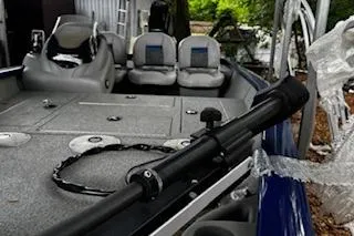 Slide: The Image of 2017 Tracker Pro Team 175 TF boat with seating and fishing rod holder. - 9