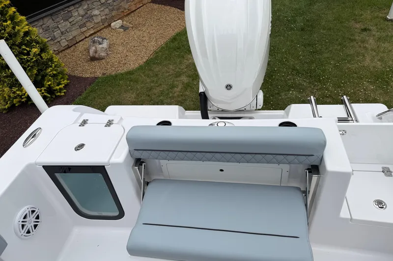 Slide: The Image of 2026 Sportsman Open 232 Center Console boat with sleek seating and modern design. - 17
