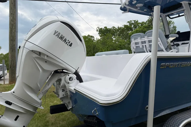 Slide: The Image of 2026 Sportsman Open 232 Center Console boat with Yamaha outboard motor. - 6