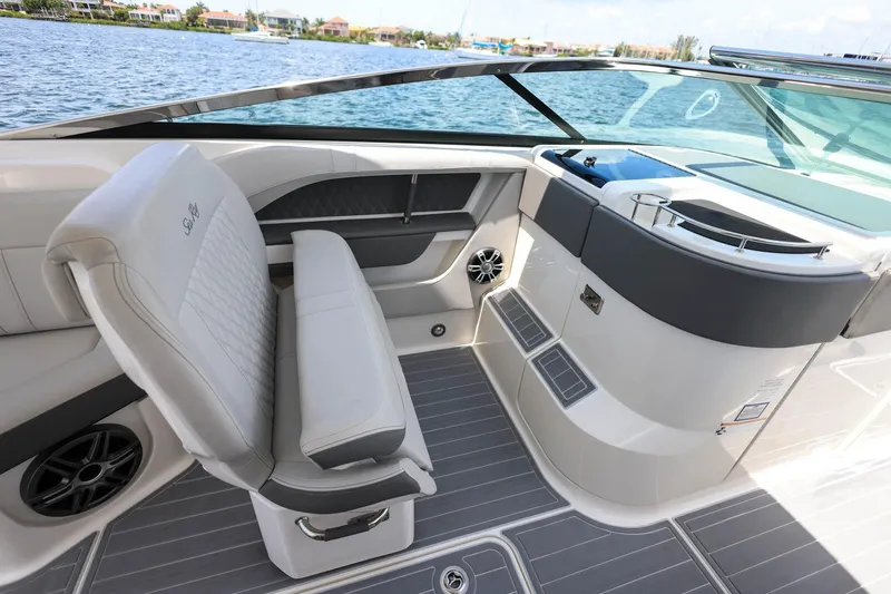 Slide: The Image of Luxurious interior of 2022 Sea Ray SLX 310 Outboard boat with elegant seating and sleek design. - 15
