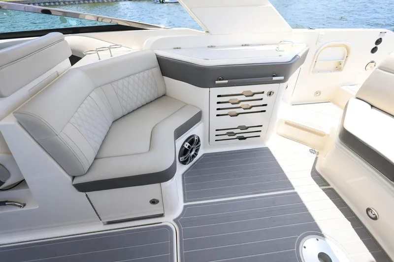 Slide: The Image of Luxurious interior of 2022 Sea Ray SLX 310 Outboard with elegant seating and sleek design. - 19