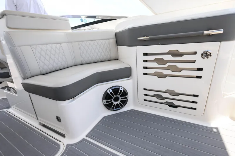 Slide: The Image of Luxurious seating on 2022 Sea Ray SLX 310 Outboard boat with modern design accents. - 20