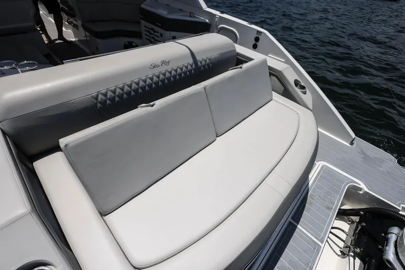 Slide: The Image of 2022 Sea Ray SLX 310 Outboard boat with luxurious seating on the water. - 33