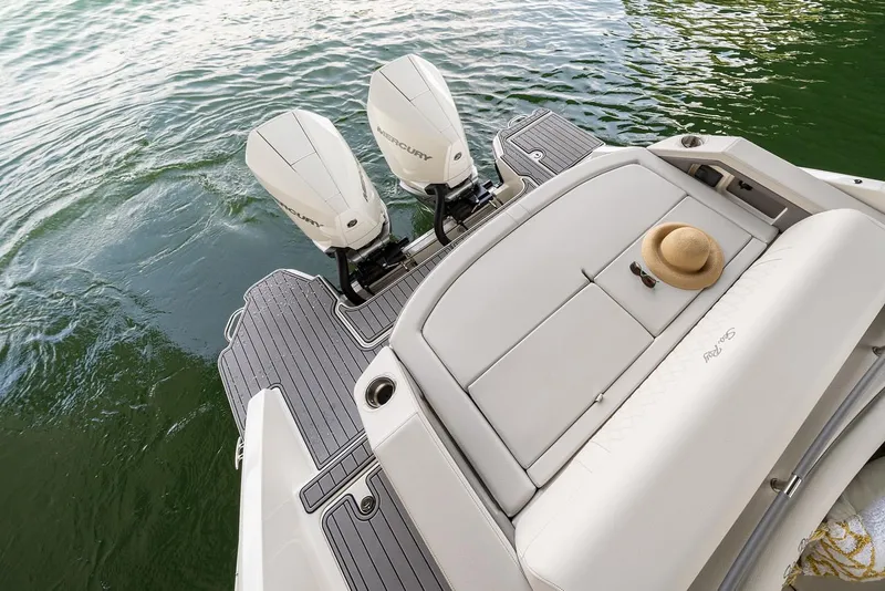 Slide: The Image of Manufacturer Provided Image: 2022 Sea Ray SLX 310 OB boat with twin outboard engines on water. - 4