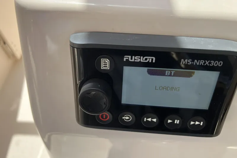 Slide: The Image of Fusion MS-NRX300 display on 2019 Grady-White Freedom 235 boat, showing "BT Loading." - 17