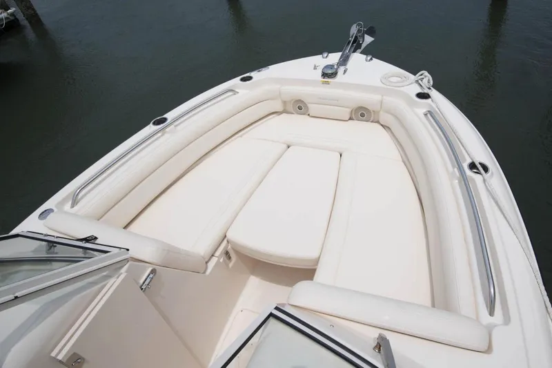 Slide: The Image of Manufacturer Provided Image: 2019 Grady-White Freedom 235 boat bow seating area with white cushions. - 30