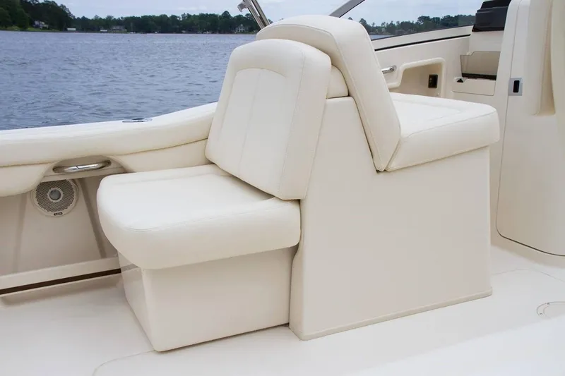 Slide: The Image of Manufacturer Provided Image: 2019 Grady-White Freedom 235 boat interior seating by the water. - 34