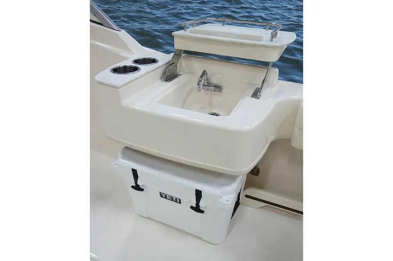 Slide: The Image of Manufacturer Provided Image: 2019 Grady-White Freedom 235 boat sink and Yeti cooler setup. - 35