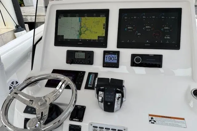 Slide: The Image of 2022 Intrepid 407 Nomad FE dashboard with navigation and control systems. - 8