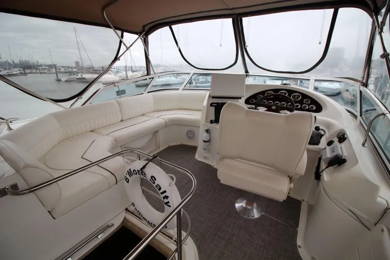 Slide: The Image of 2005 Cruisers Yachts 375 Motoryacht interior with helm and seating area. - 13