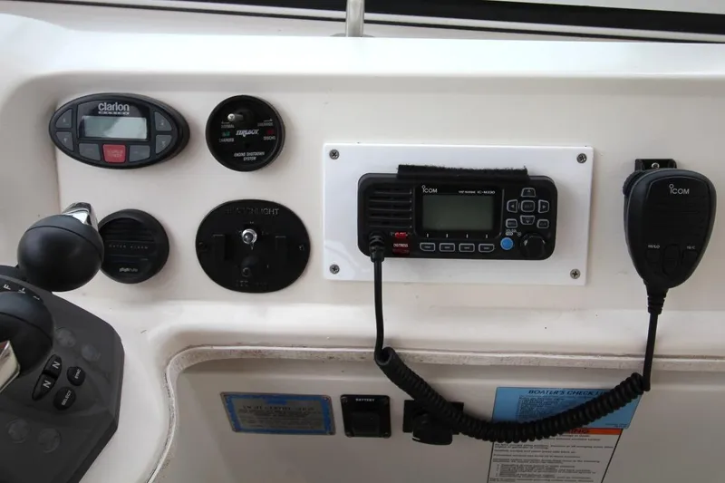 Slide: The Image of Control panel of 2005 Cruisers Yachts 375 Motoryacht with radio and navigation controls. - 17