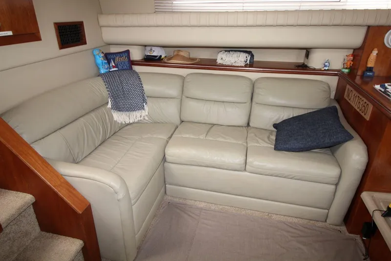 Slide: The Image of Luxurious interior of 2005 Cruisers Yachts 375 Motoryacht with beige leather sofa. - 19