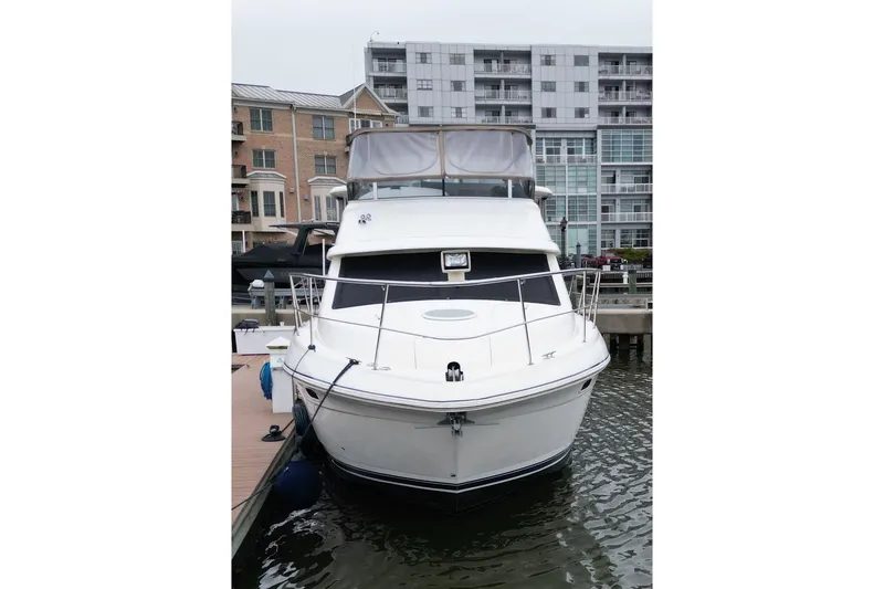 Slide: The Image of 2005 Cruisers Yachts 375 Motoryacht docked at marina, front view. - 3