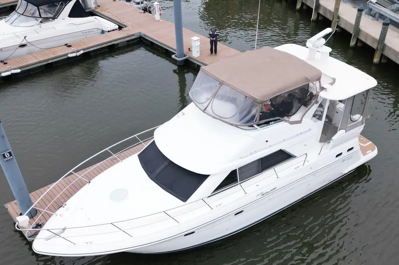 Slide: The Image of 2005 Cruisers Yachts 375 Motoryacht docked at marina, aerial view. - 6