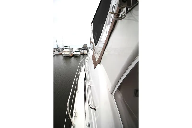 Slide: The Image of 2005 Cruisers Yachts 375 Motoryacht docked at marina, side view. - 8