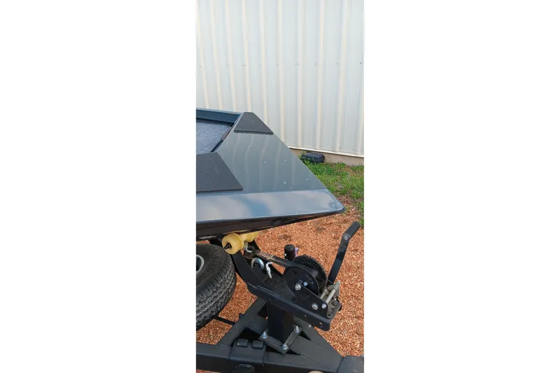 Slide: The Image of 2026 Ranger RT188C boat trailer hitch and winch system close-up. - 2