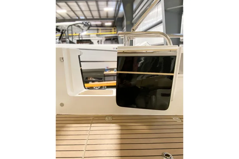 Slide: The Image of 2022 MJM 3 boat interior with sleek design and wooden flooring. - 73