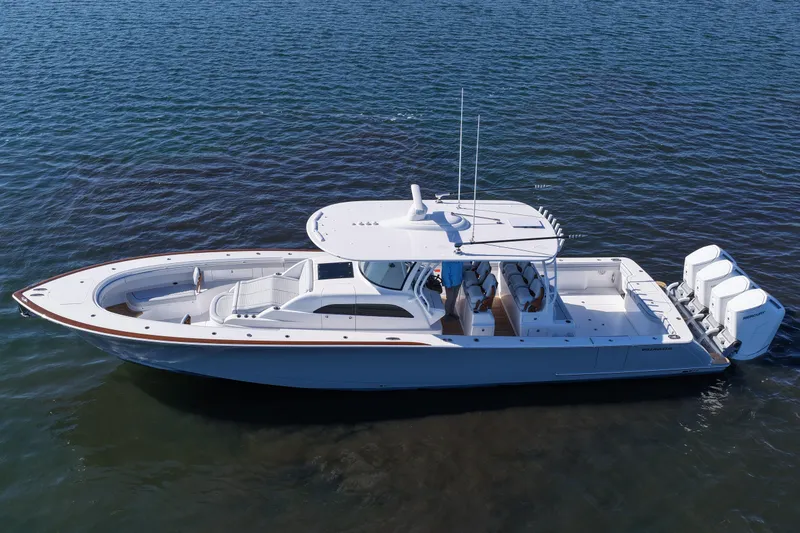 Slide: The Image of 2026 Valhalla Boatworks V-46 on water, featuring sleek design and powerful engines. - 14