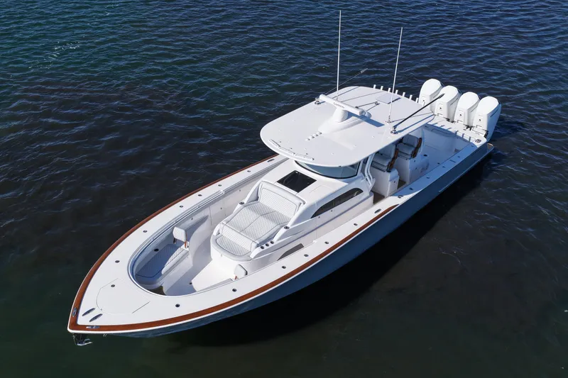 Slide: The Image of 2026 Valhalla Boatworks V-46 luxury boat on open water, aerial view. - 15