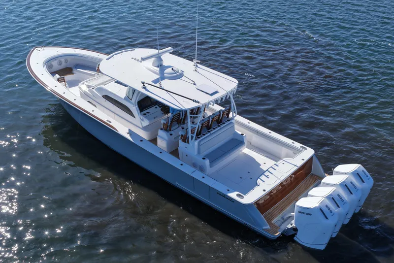 Slide: The Image of 2026 Valhalla Boatworks V-46 on water, featuring sleek design and powerful engines. - 16