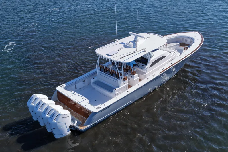 Slide: The Image of 2026 Valhalla Boatworks V-46 cruising on open water, showcasing sleek design and powerful engines. - 18