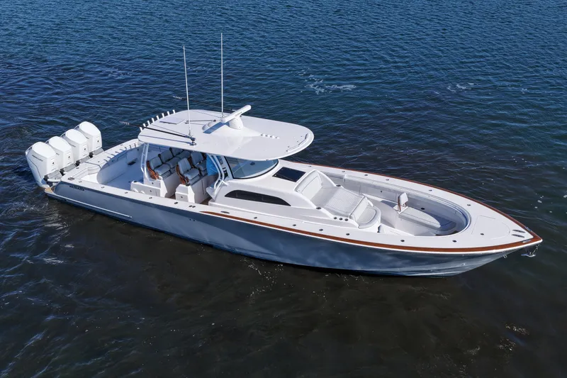 Slide: The Image of 2026 Valhalla Boatworks V-46 cruising on open water, showcasing sleek design and powerful engines. - 19