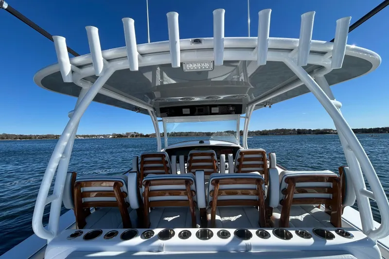 Slide: The Image of 2026 Valhalla Boatworks V-46 on water, featuring spacious seating and sleek design. - 21