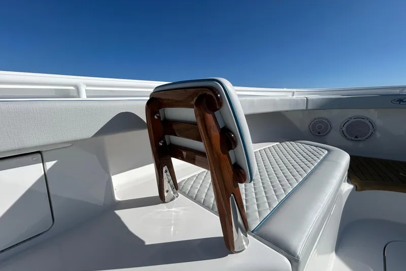 Slide: The Image of Luxurious seating on 2026 Valhalla Boatworks V-46, featuring elegant wood and leather design. - 28