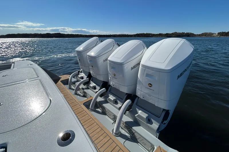 Slide: The Image of 2026 Valhalla Boatworks V-46 with triple Mercury outboard engines on a sunny day. - 34