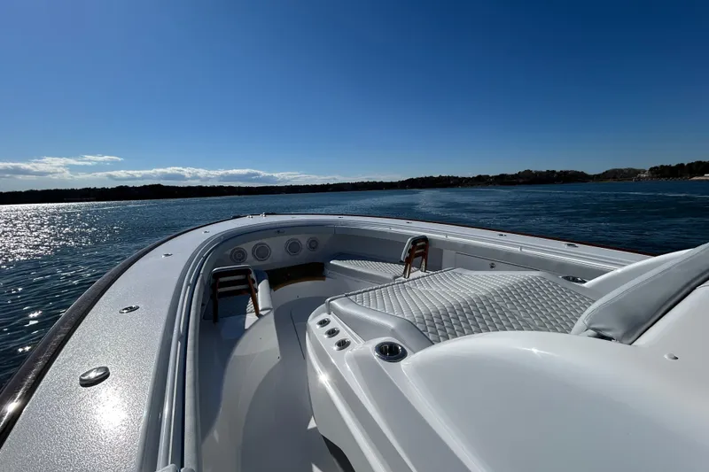 Slide: The Image of Valhalla Boatworks V-46, 2026 model, cruising on a sunny day with clear skies. - 39